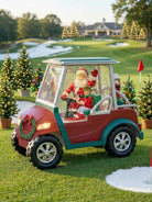 golf cart snow globe sown on a golf course at Christmas
