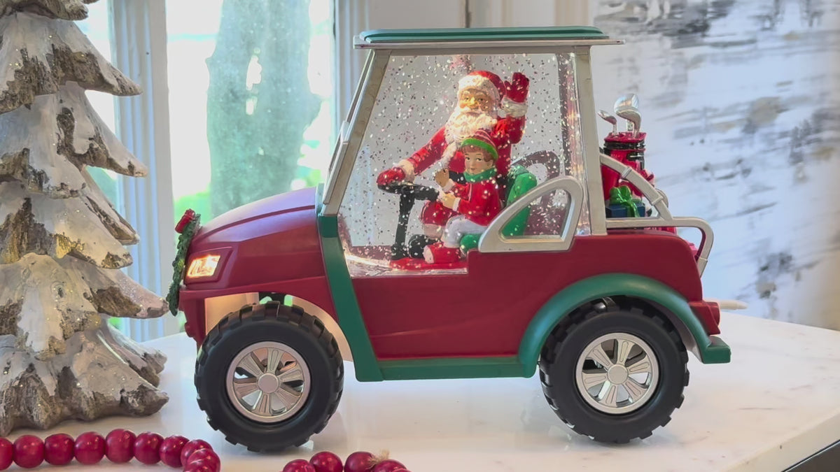 golf cart snow globe set in a Christmas scene