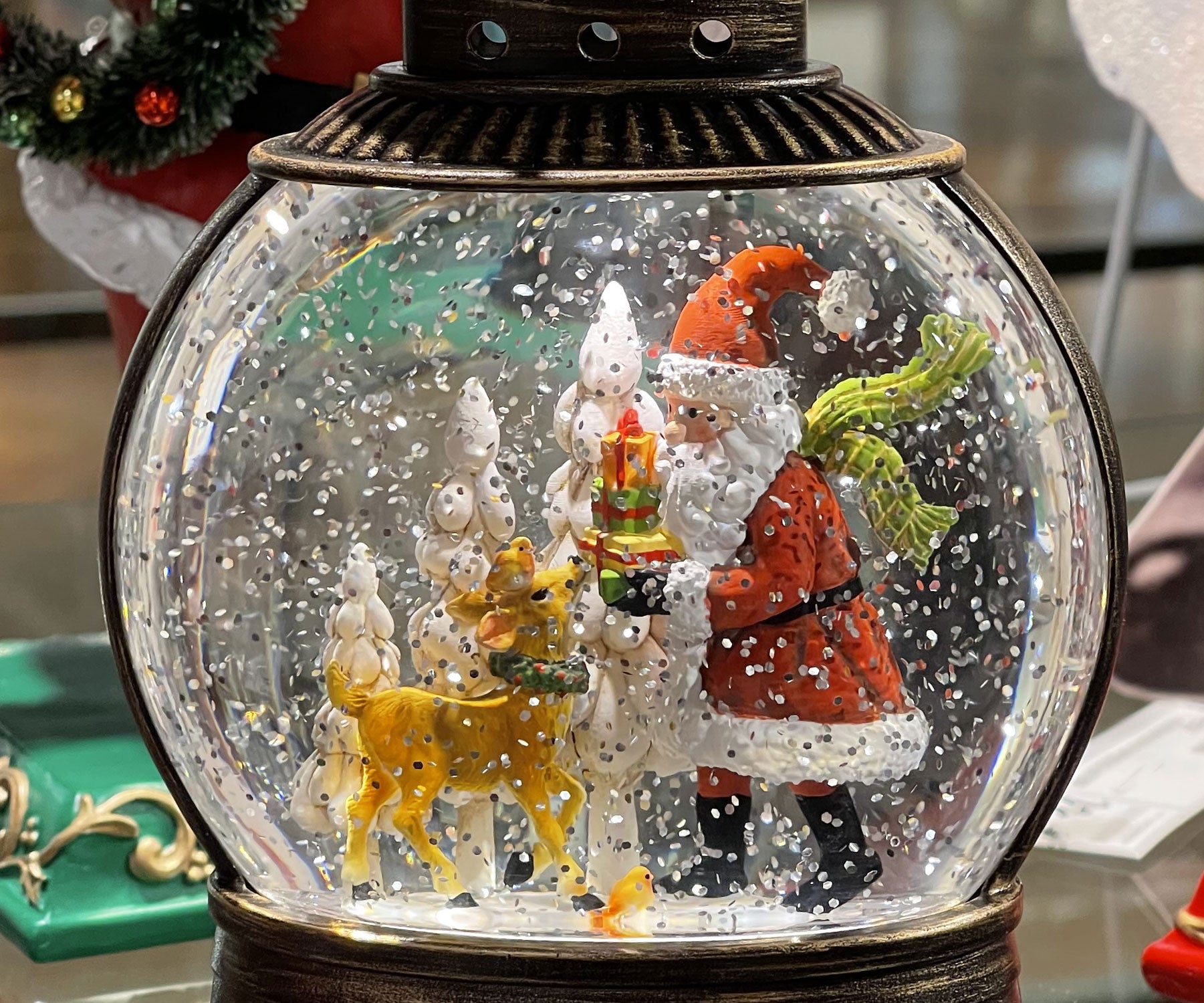 Santa With Animals Bringing Gifts Snow Globe In Bronze Water Lantern ...